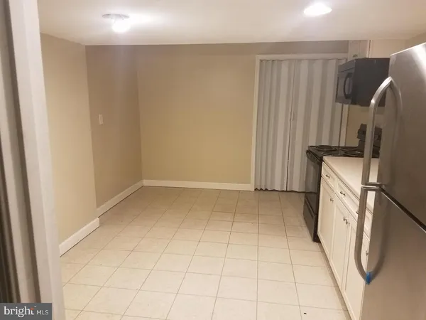 a view of a storage & utility room with washer and dryer