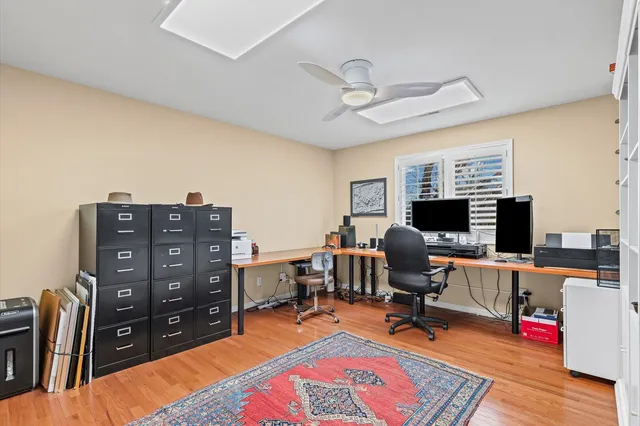 a view of a house with backyard porch and sitting area