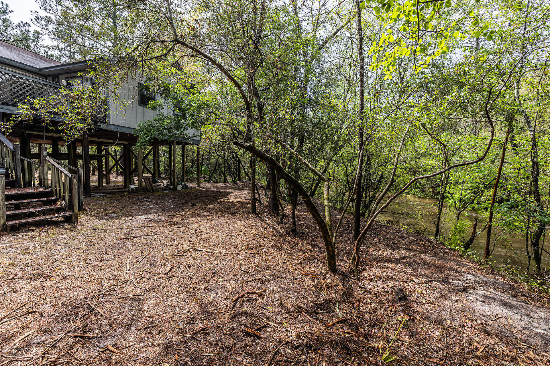 3877 Hinote Road Crestview, FL 32539 - Photo 25 of 33 a view of outdoor space with deck and tree