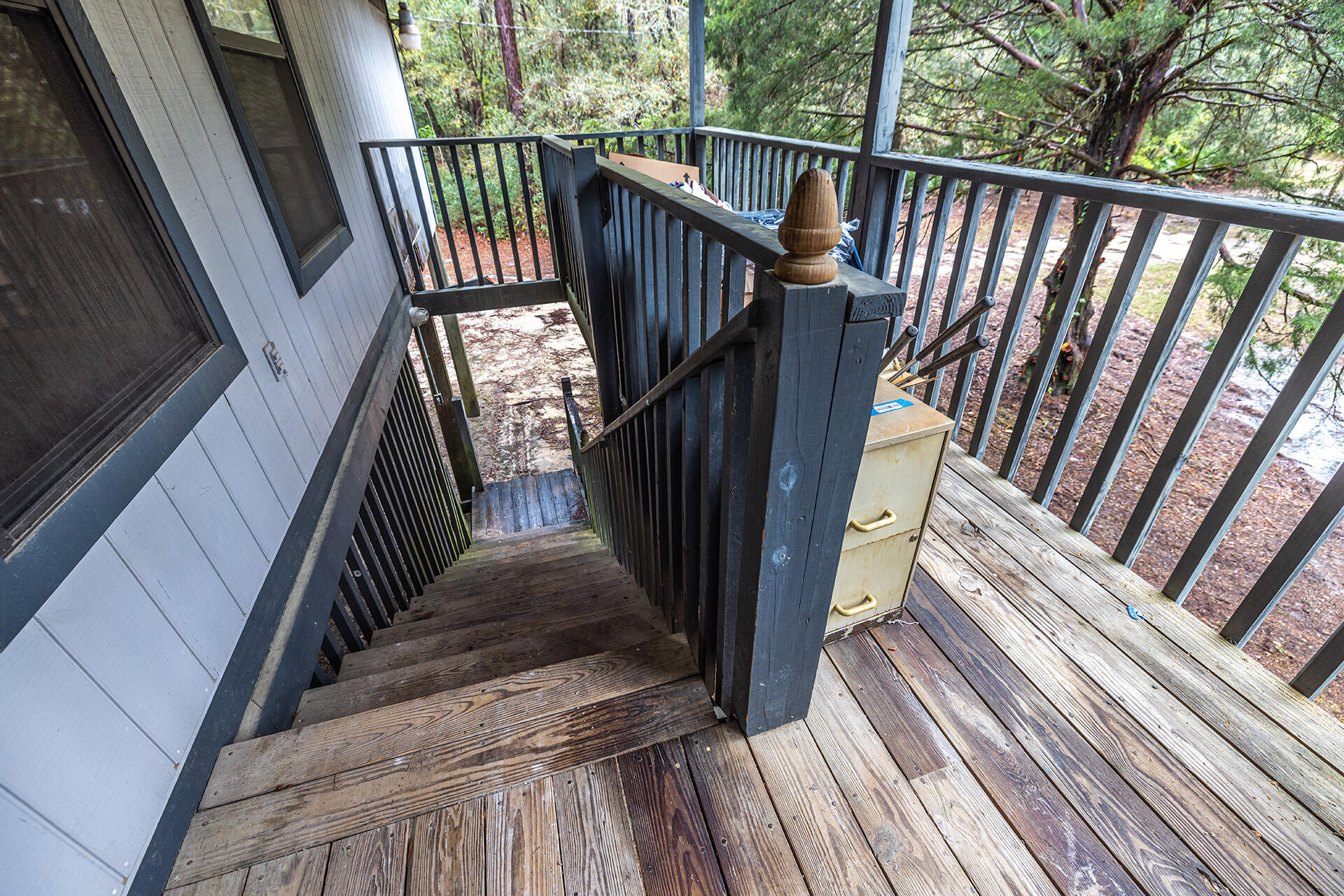 3877 Hinote Road Crestview, FL 32539 - Photo 32 of 33 a view of balcony with wooden floor and fence