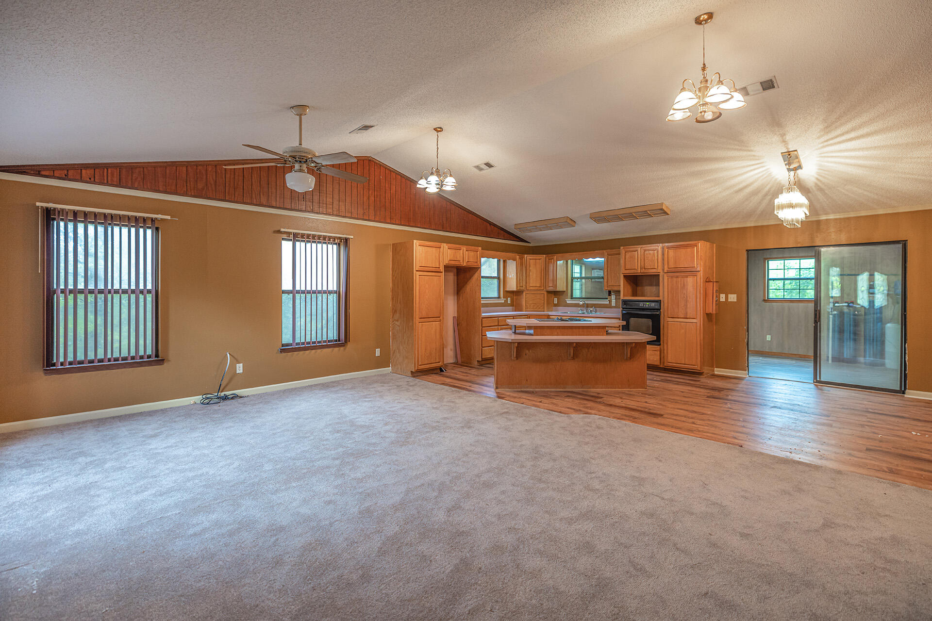 3877 Hinote Road Crestview, FL 32539 - Photo 5 of 33 a view of an empty room with a window and kitchen view