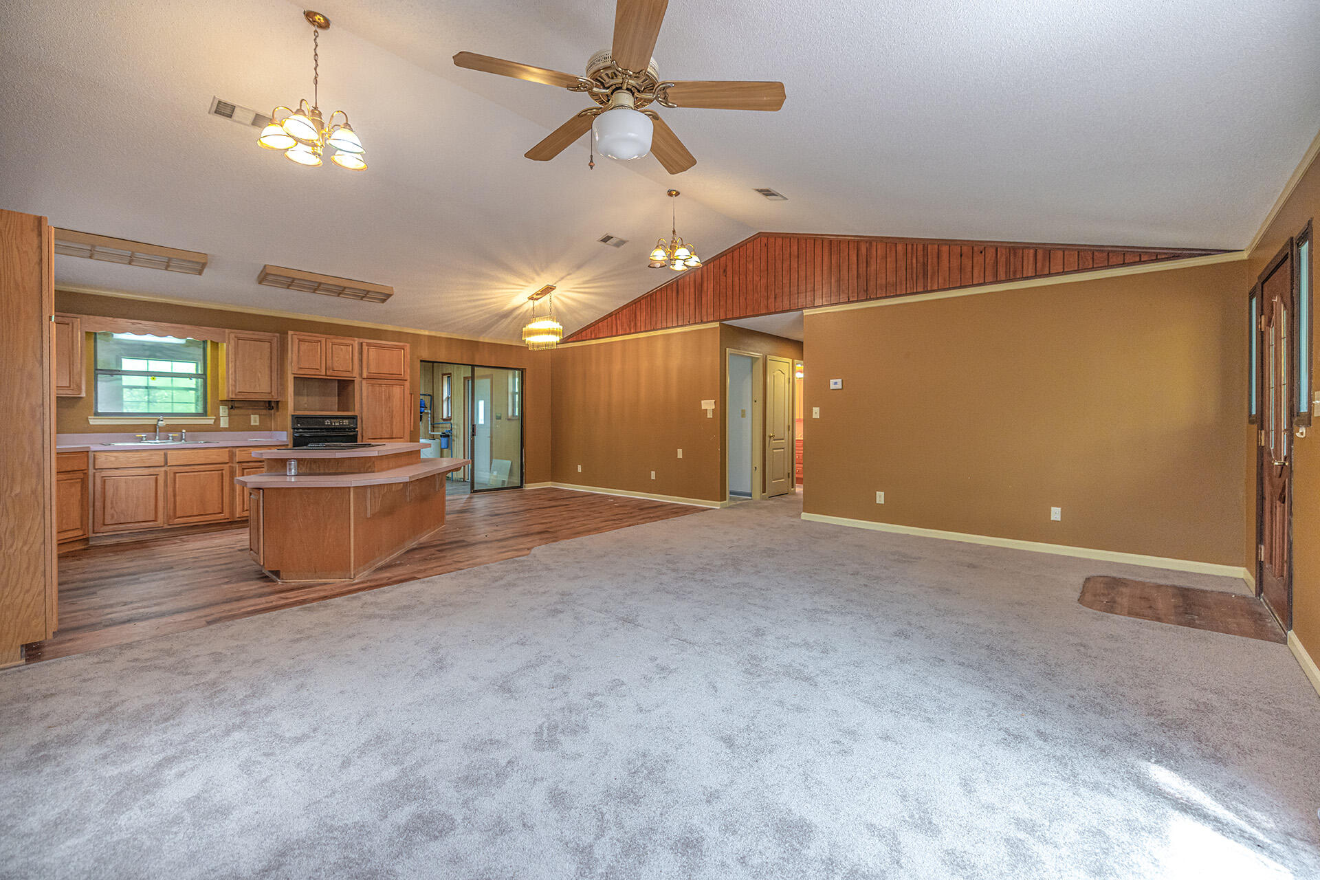 3877 Hinote Road Crestview, FL 32539 - Photo 6 of 33 a view of a kitchen with a stove cabinets and a kitchen