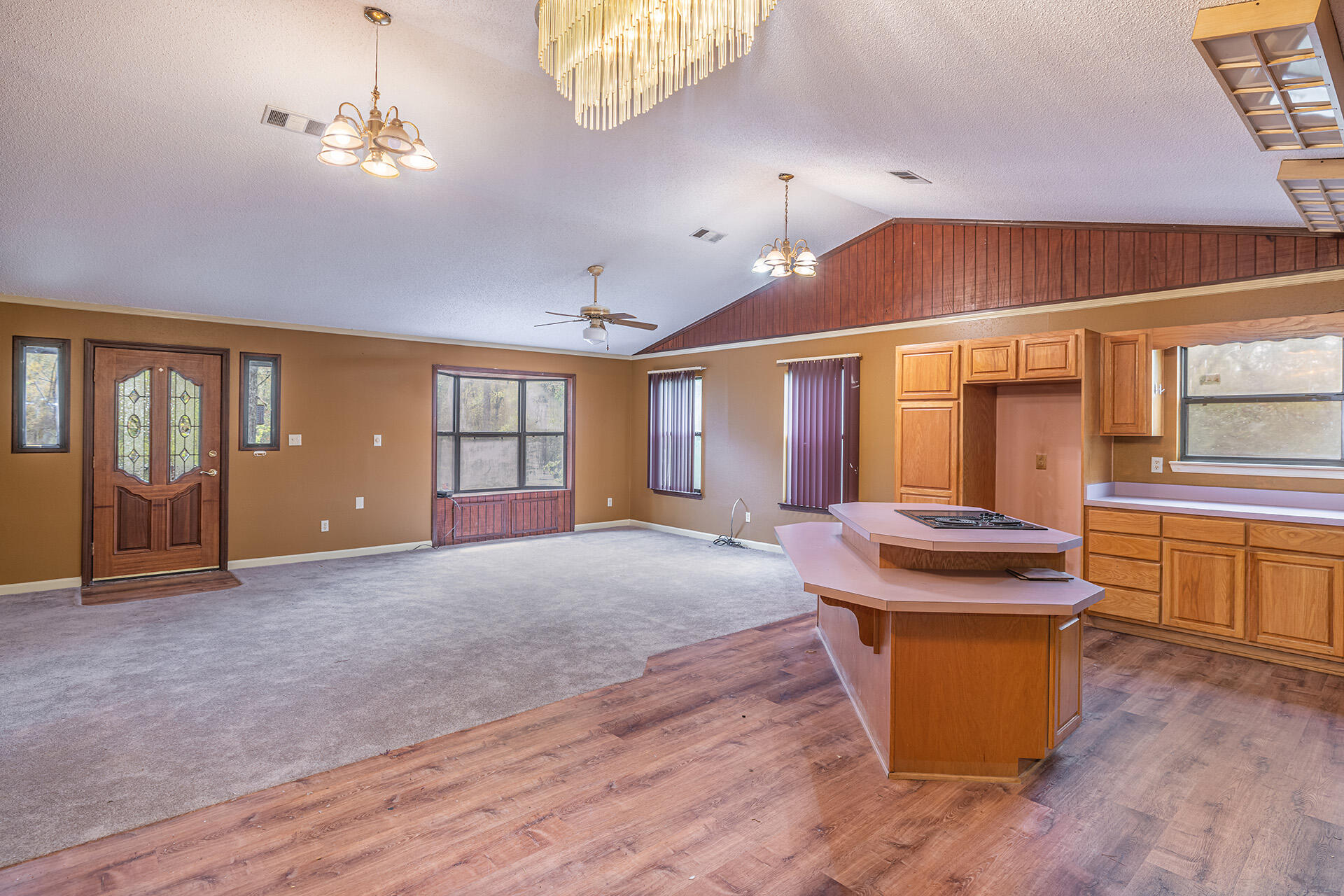 3877 Hinote Road Crestview, FL 32539 - Photo 8 of 33 a view of a livingroom with furniture window and wooden floor