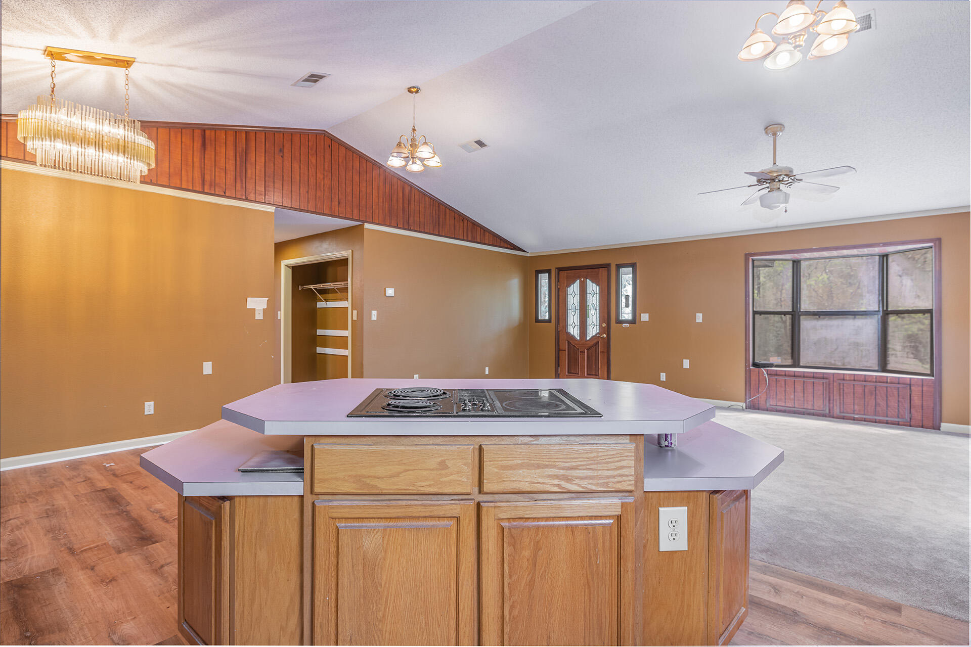 3877 Hinote Road Crestview, FL 32539 - Photo 9 of 33 a kitchen with stainless steel appliances kitchen island a chandelier