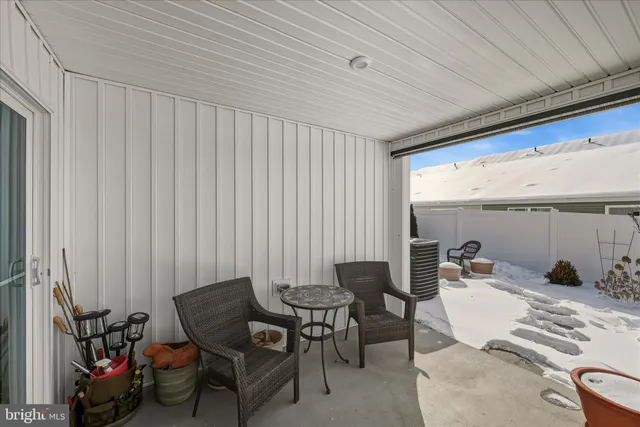 a room with furniture and a window