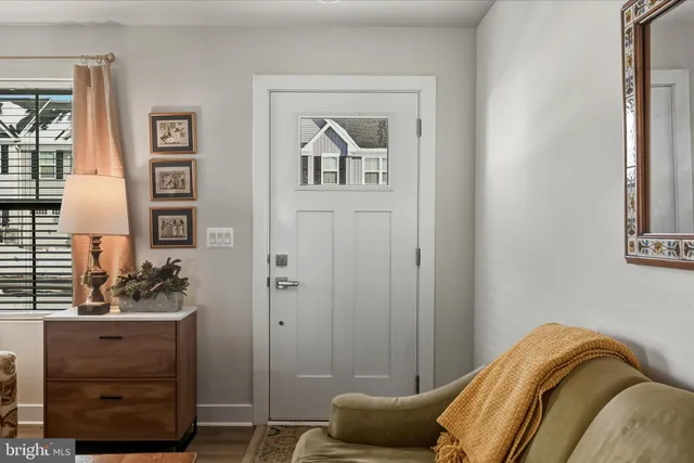 a bedroom with a bed and cabinet
