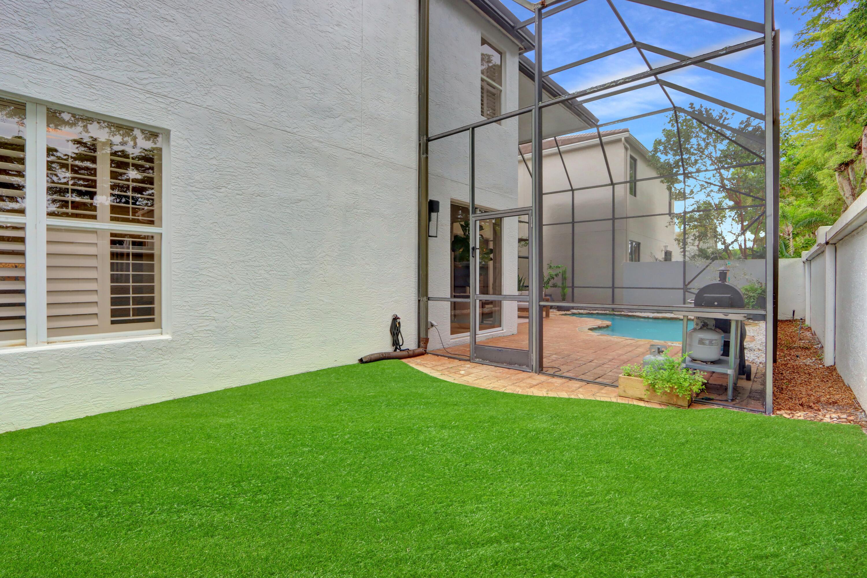 6644 Northwest 42nd Way Boca Raton, FL 33496 - Photo 15 of 34 Rear Open Astroturfed Area