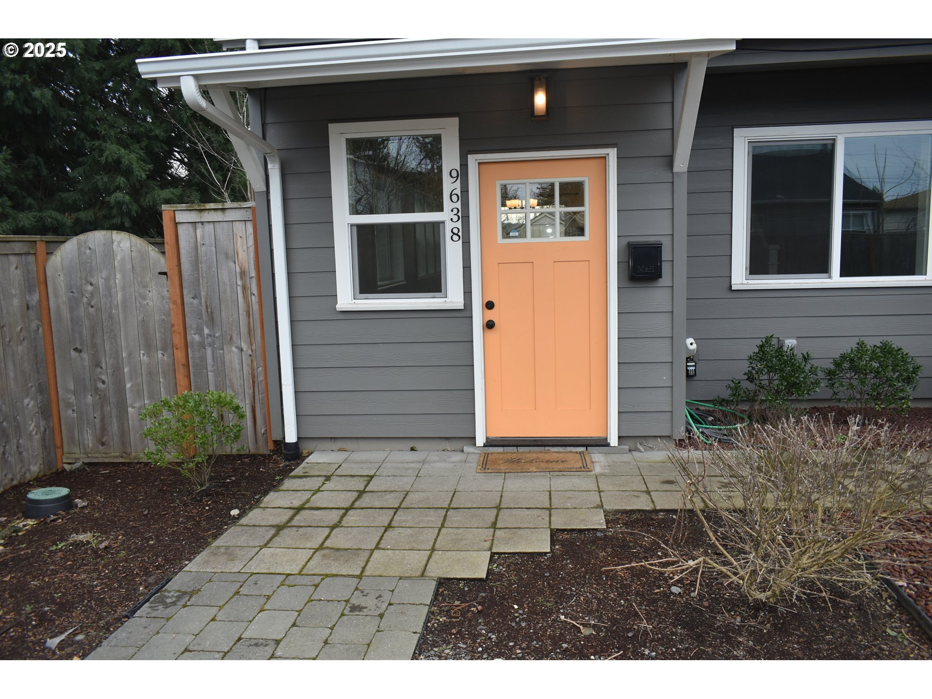 9628 Southeast Holgate Boulevard Portland, OR 97266 - Photo 3 of 15 a view of backyard with barbeque grill and plants