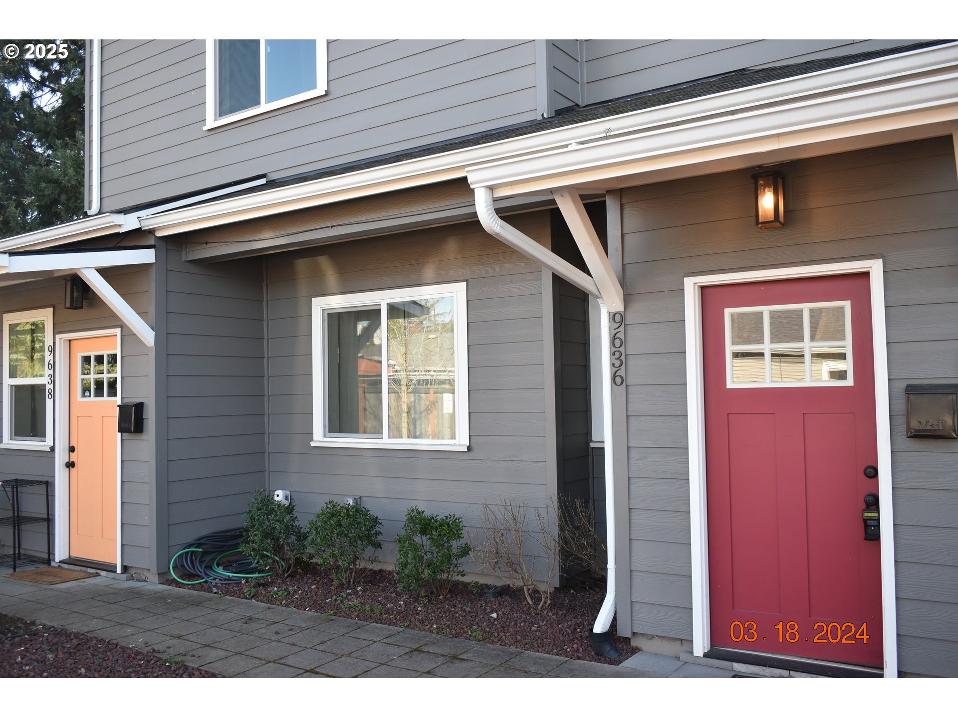 9628 Southeast Holgate Boulevard Portland, OR 97266 - Photo 4 of 15 a front view of a house with a yard
