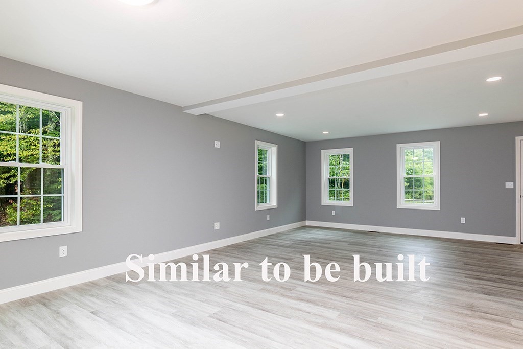 677 South Road Templeton, MA 01468 - Photo 12 of 23 a view of an empty room with wooden floor and a window
