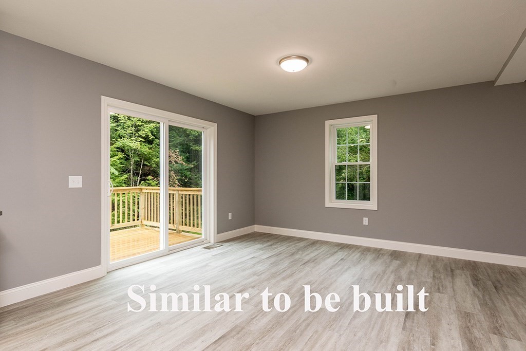 677 South Road Templeton, MA 01468 - Photo 13 of 23 a view of an empty room with wooden floor and a window