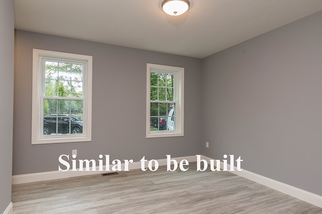677 South Road Templeton, MA 01468 - Photo 14 of 23 a view of an empty room with wooden floor and a window