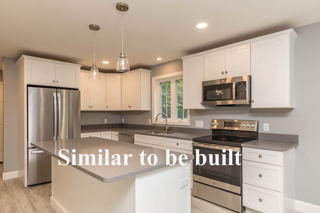 677 South Road Templeton, MA 01468 - Photo 10 of 23 a kitchen with stainless steel appliances granite countertop a stove a sink and a refrigerator