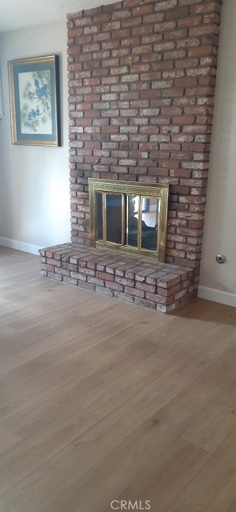 1484 Pepper Tree Drive Hemet, CA 92545 - Photo 12 of 29 double sided fireplace