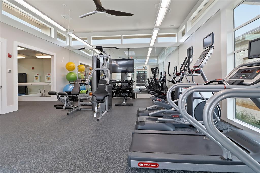 651 Watters Road, Unit 8202 Allen, TX 75013 - Photo 25 of 32 a view of a room with gym equipment
