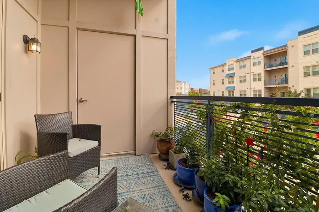 a kitchen with sink cabinets and appliances