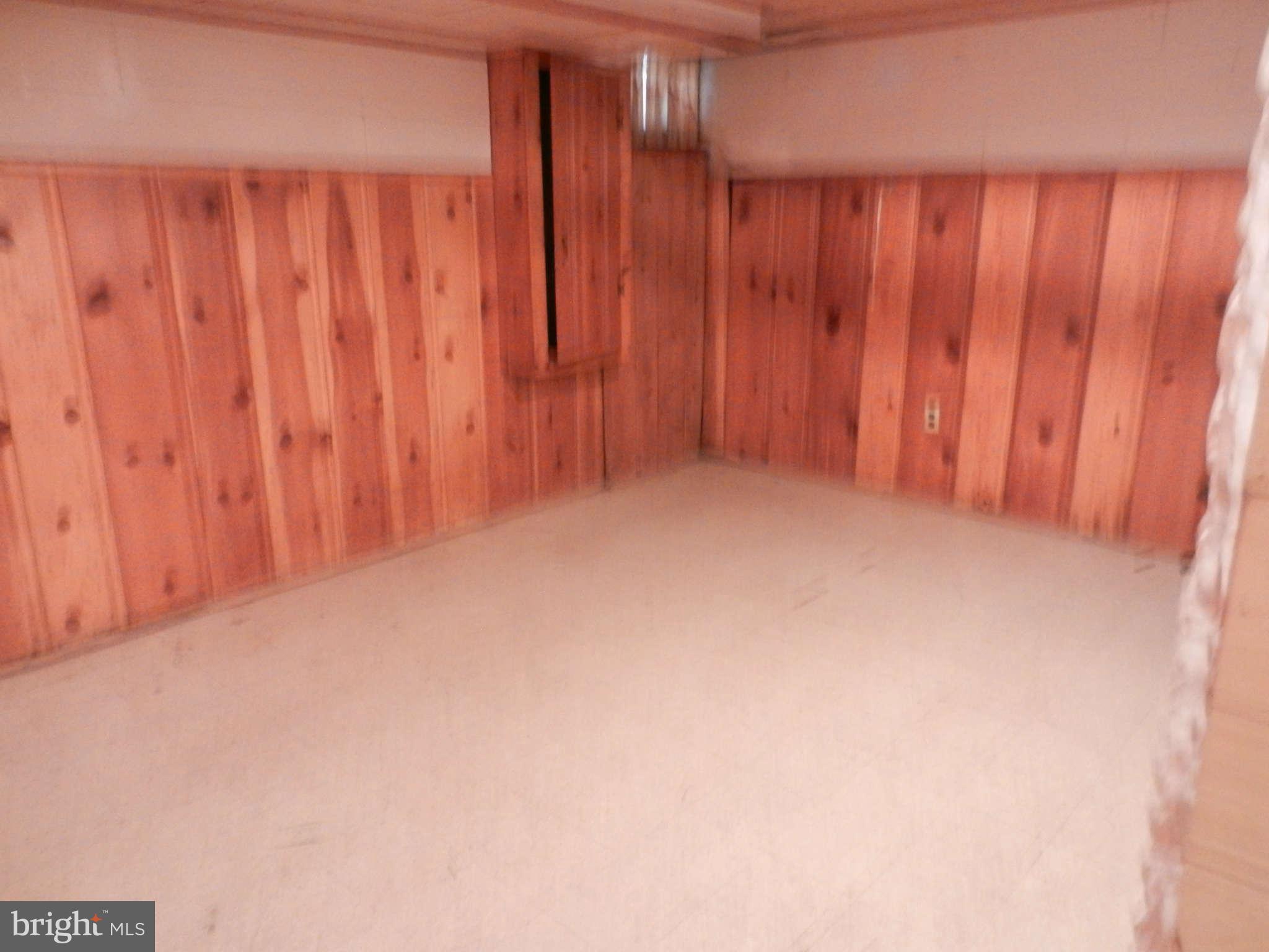 6124 Marlora Road Baltimore, MD 21239 - Photo 10 of 12 a view of wooden floor