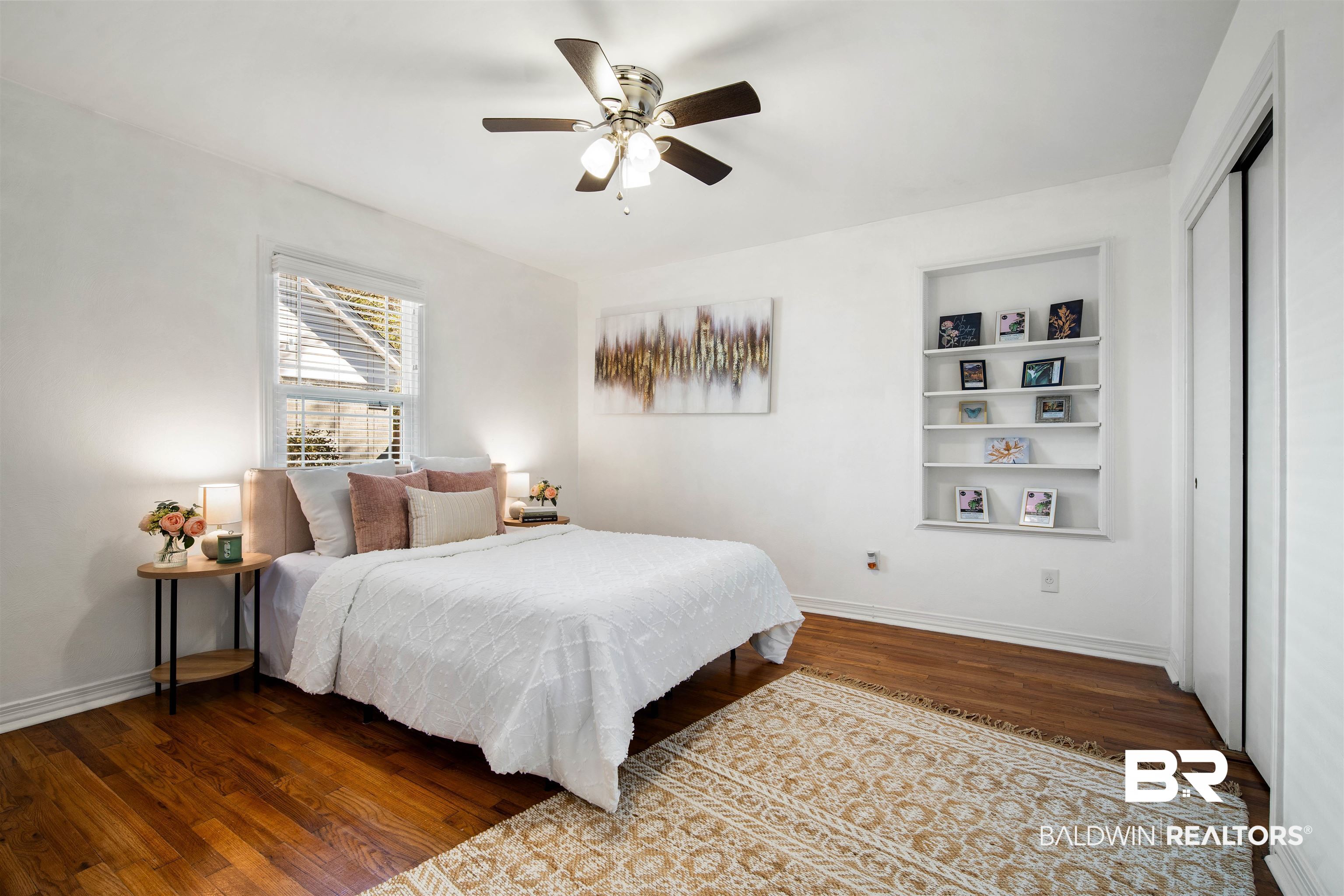 2615 Walton Avenue Mobile, AL 36606 - Photo 26 of 33 Bedroom with a ceiling fan, a closet, baseboards, and wood finished floors
