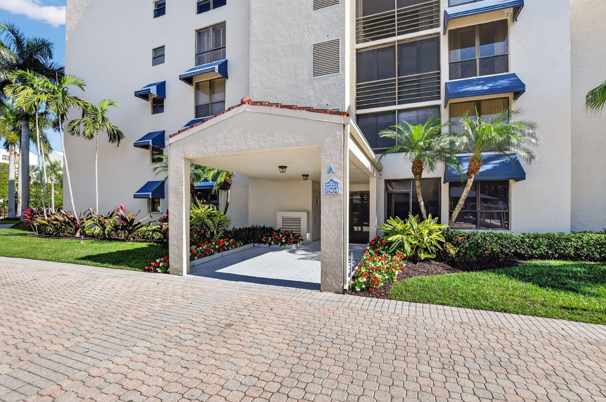 7564 Regency Lake Drive, Unit 701 Boca Raton, FL 33433 - Photo 1 of 47 front