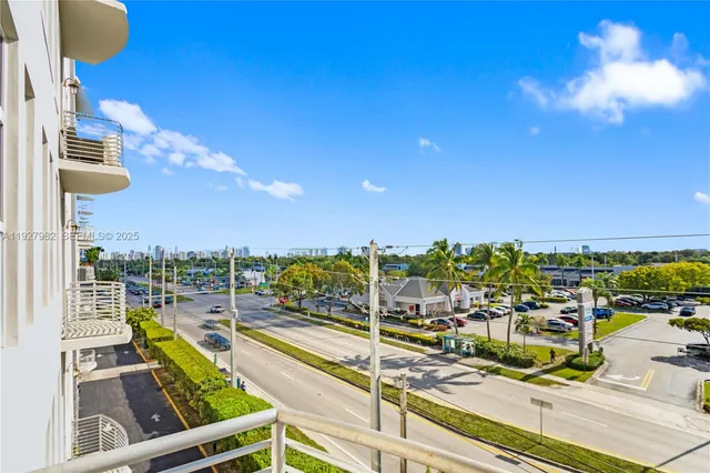 a kitchen with stainless steel appliances granite countertop a stove a sink dishwasher and cabinets