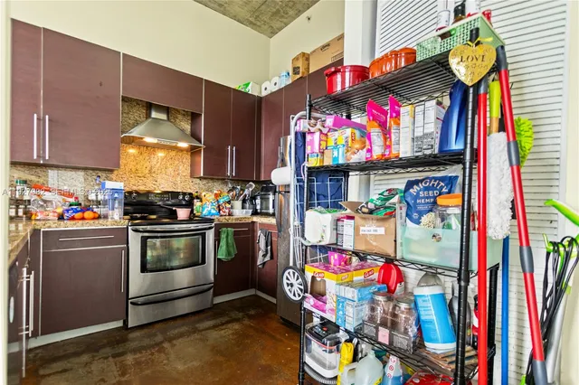 a bathroom with a bath tub a sink and a shower curtain