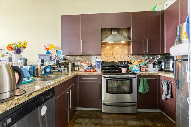a store room with lots of different colored cloths