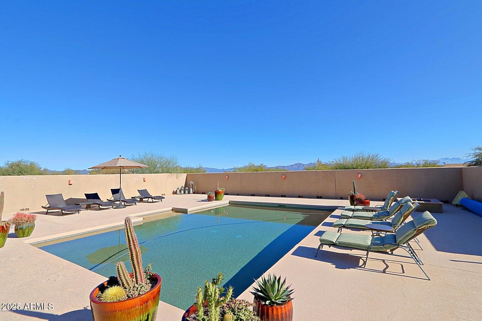 15320 East Skinner Drive Scottsdale, AZ 85262 - Photo 3 of 21 a terrace with outdoor seating and city view