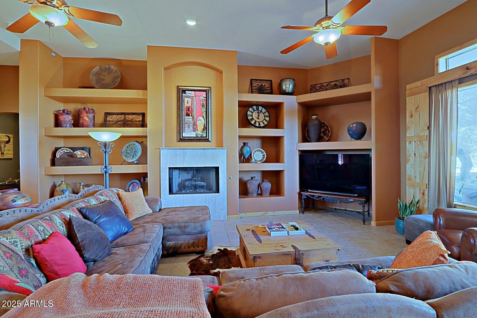 15320 East Skinner Drive Scottsdale, AZ 85262 - Photo 9 of 21 a living room with furniture workspace and a window