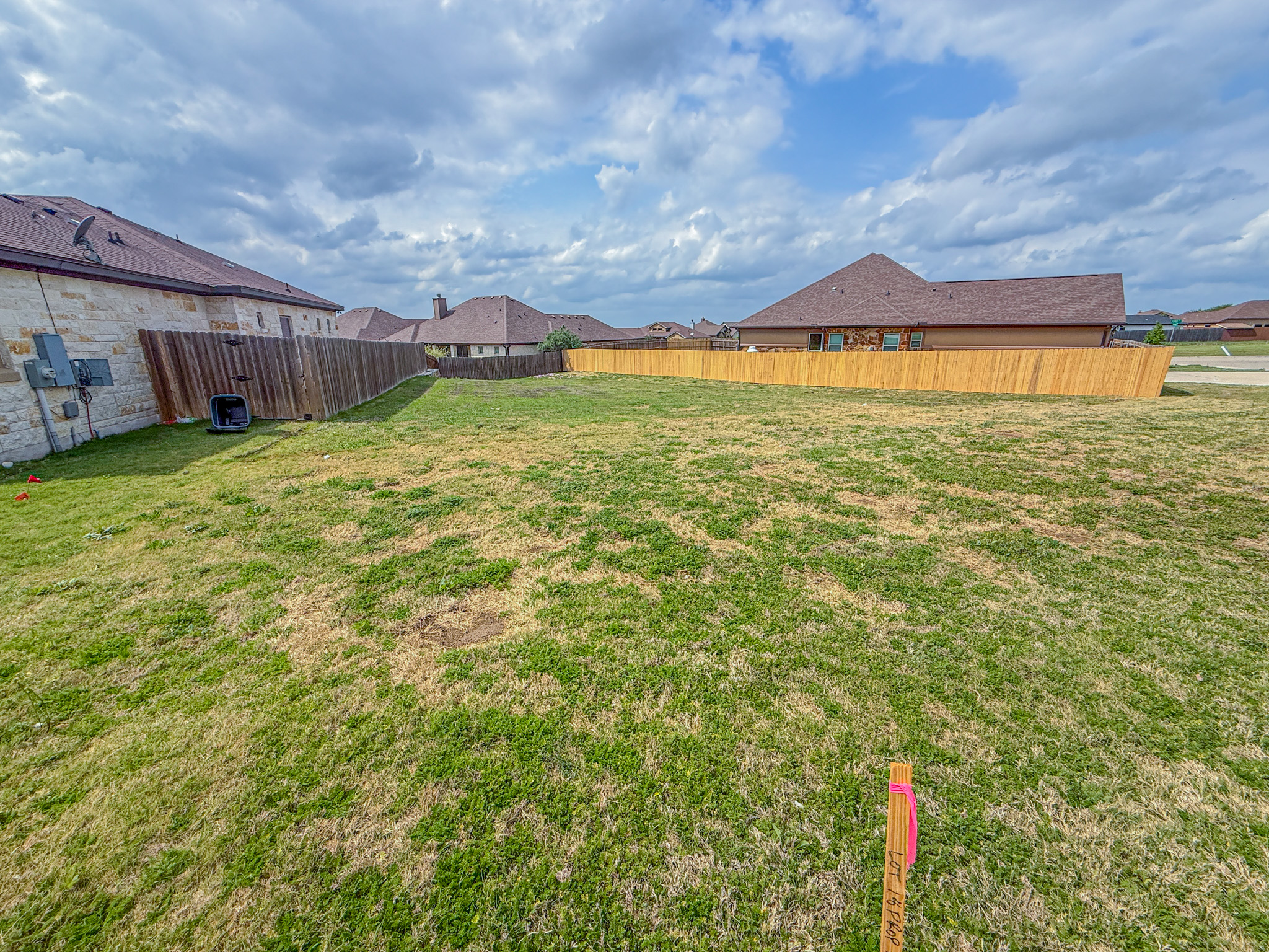 169 Greg Lane Jarrell, TX 76537 - Photo 3 of 5 Fenced yard featuring a residential view