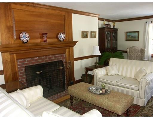 79 Nashaway Road Bolton, MA 01740 - Photo 8 of 26 a living room with furniture and a fireplace