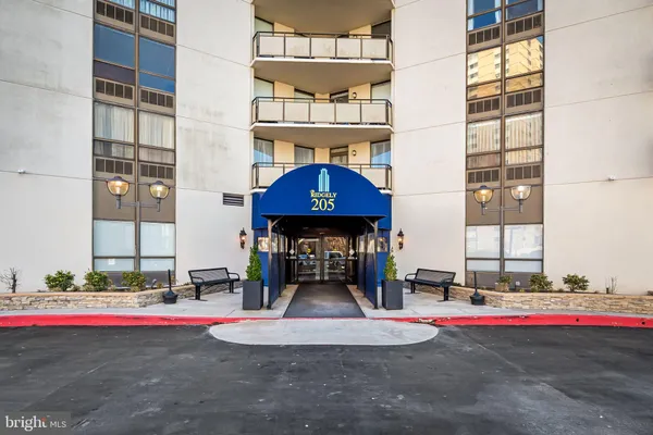 a front view of a building with street view