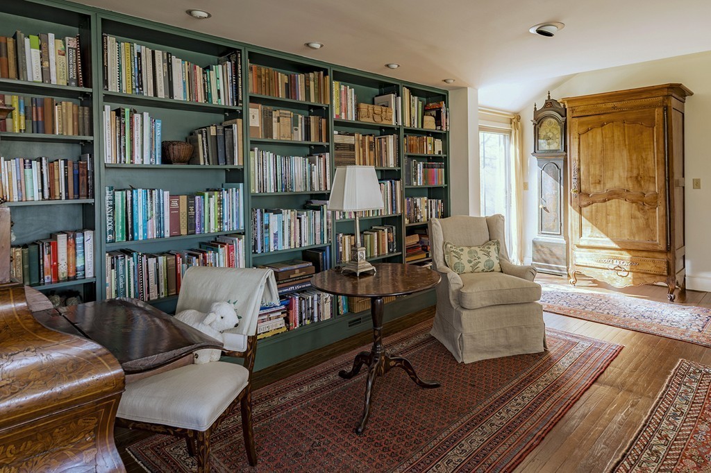 134 Argilla Road Ipswich, MA 01938 - Photo 7 of 10 a living room with furniture and a book shelf