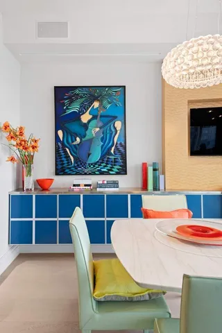 a room with gym equipment and a large window