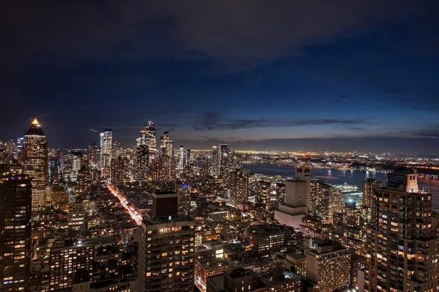 a spacious bathroom with a bathtub and a sink