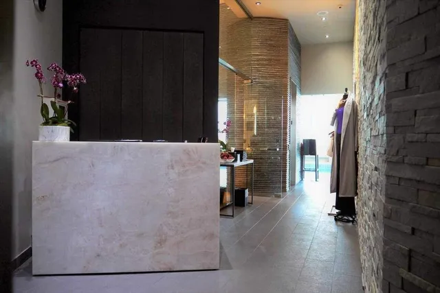 a bathroom with a toilet and a sink