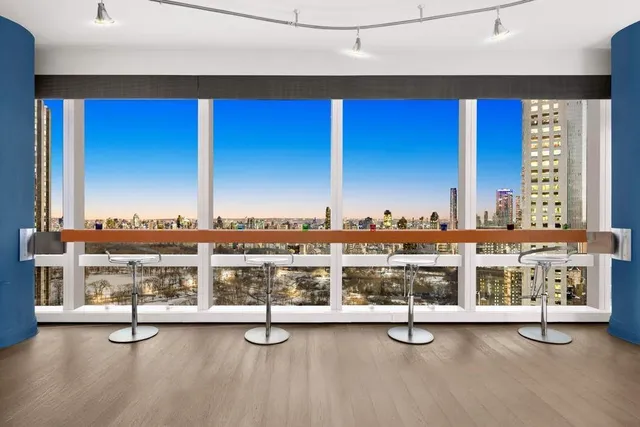 a view of a city with tall buildings