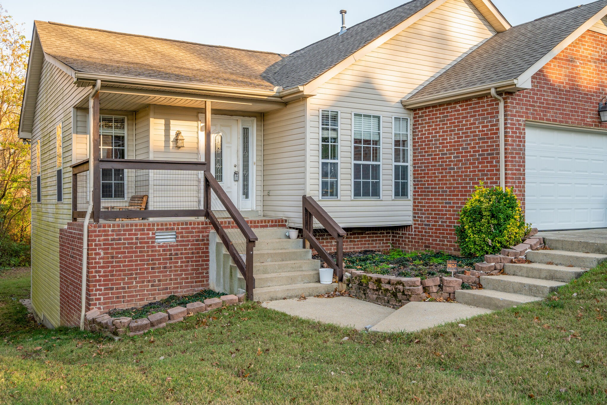 2302 Rader Ridge Road Antioch, TN 37013 - Photo 1 of 19 a view of a house with sitting area and garden