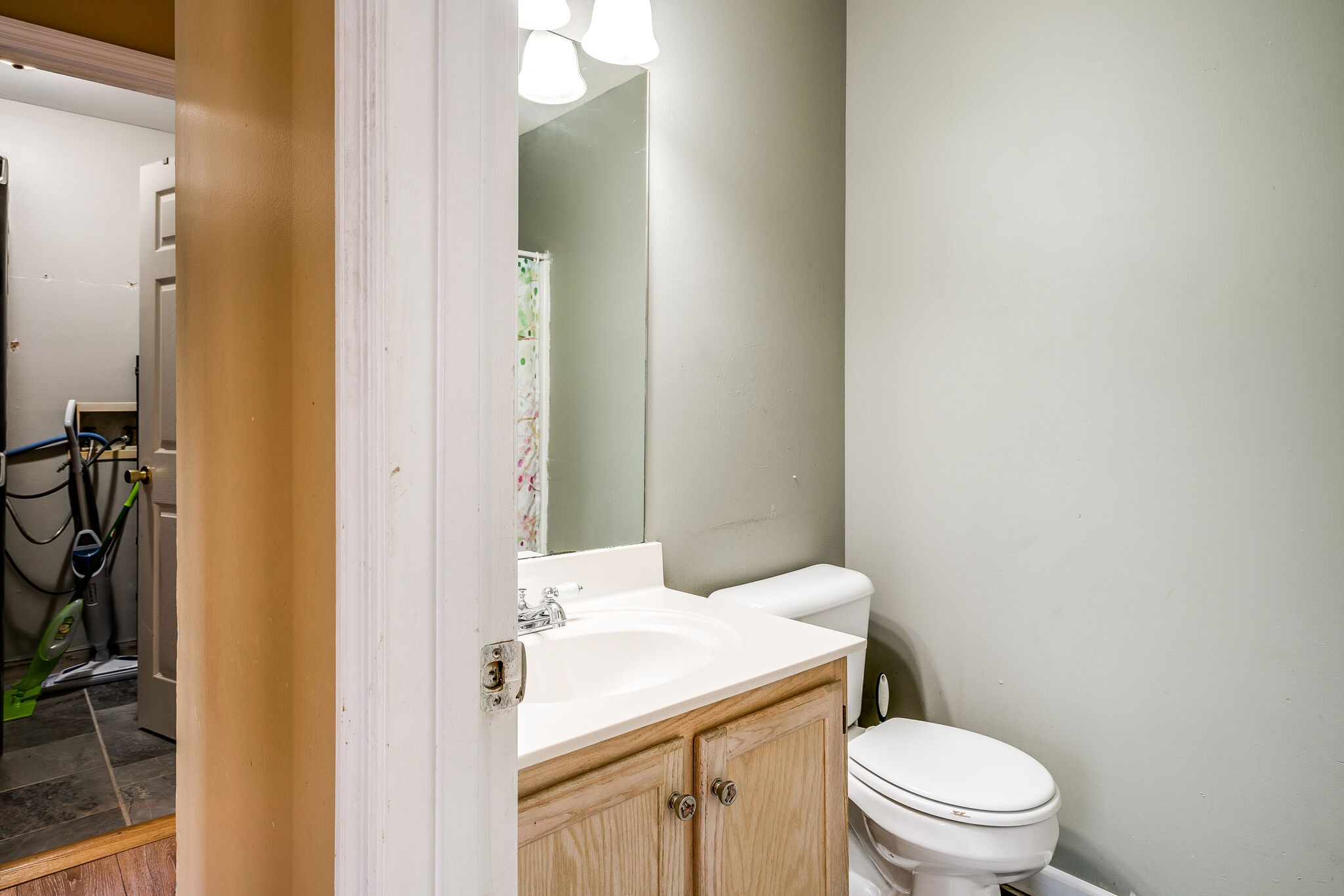 2302 Rader Ridge Road Antioch, TN 37013 - Photo 11 of 19 a bathroom with a granite countertop sink toilet and shower