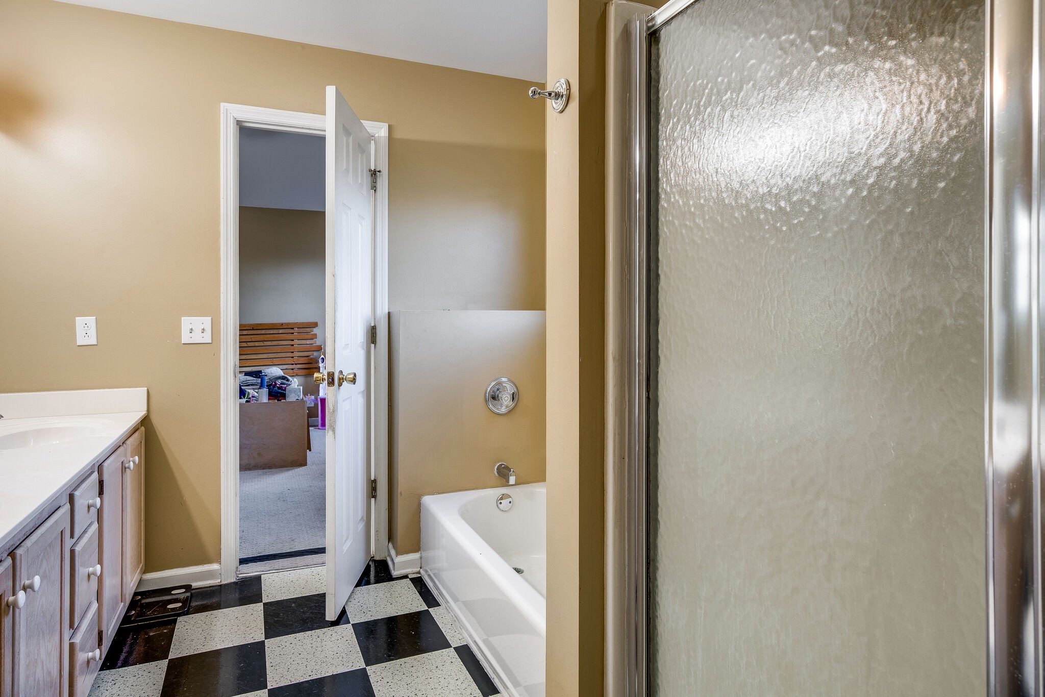 2302 Rader Ridge Road Antioch, TN 37013 - Photo 14 of 19 a bathroom with a bathtub and a shower