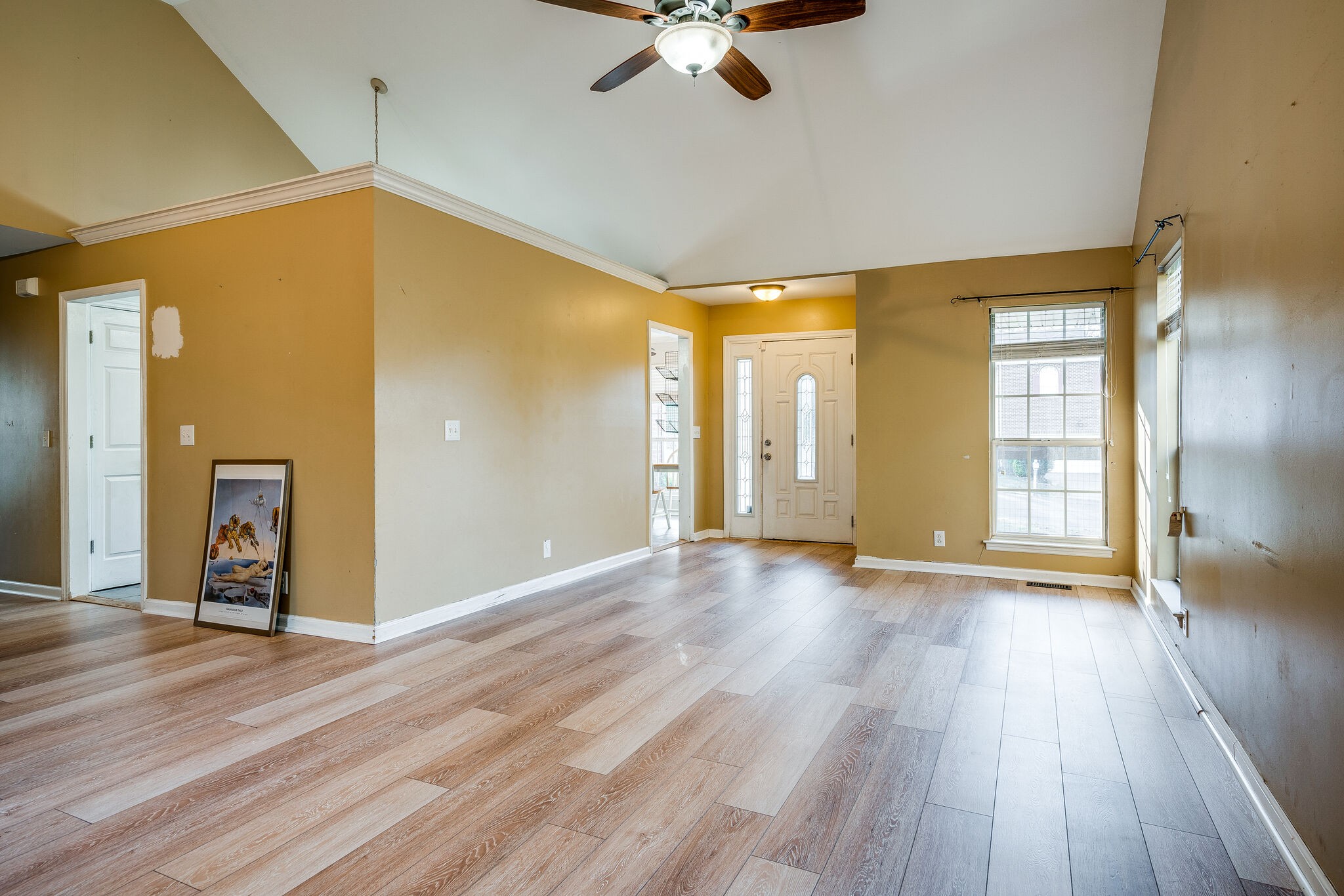 2302 Rader Ridge Road Antioch, TN 37013 - Photo 4 of 19 a view of an empty room with window and wooden floor