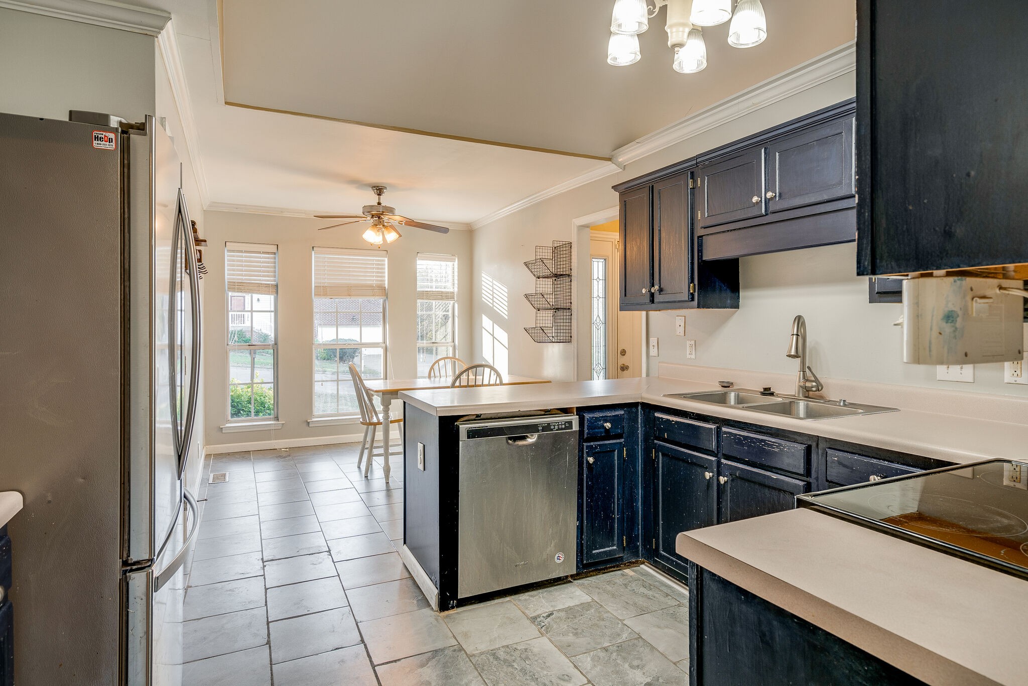 2302 Rader Ridge Road Antioch, TN 37013 - Photo 6 of 19 a kitchen with a sink appliances and cabinets