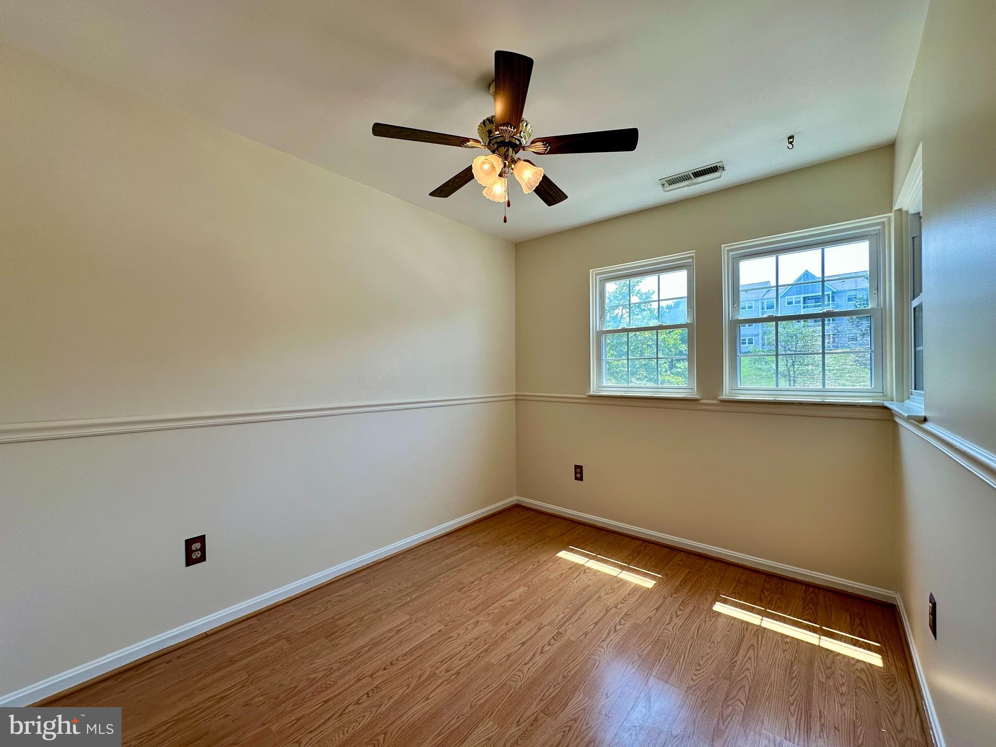 8493 Falls Run Road, Unit D Ellicott City, MD 21043 - Photo 11 of 44 Dining room with new paint, ceiling fan