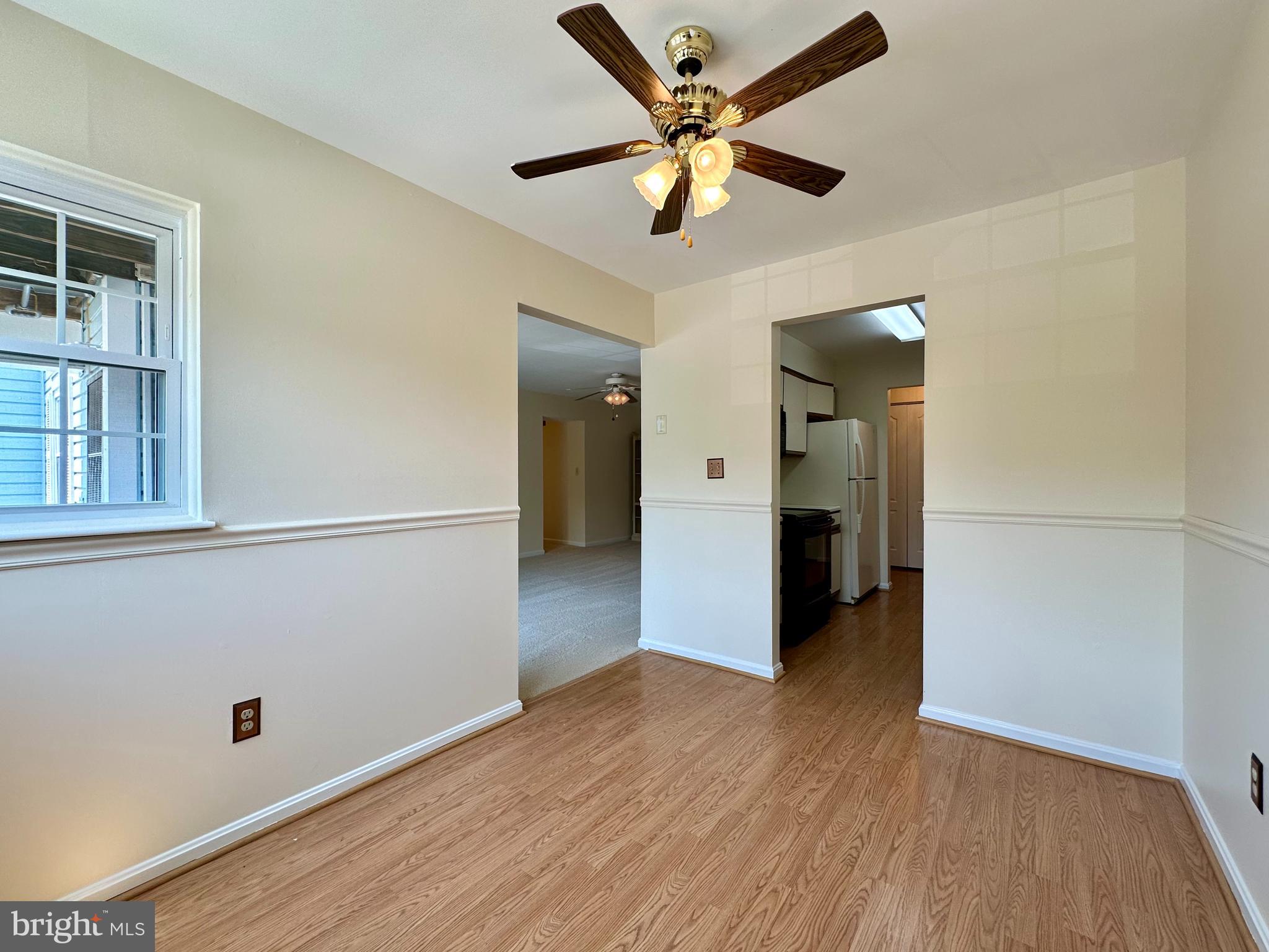 8493 Falls Run Road, Unit D Ellicott City, MD 21043 - Photo 13 of 44 Dining room with new paint, ceiling fan