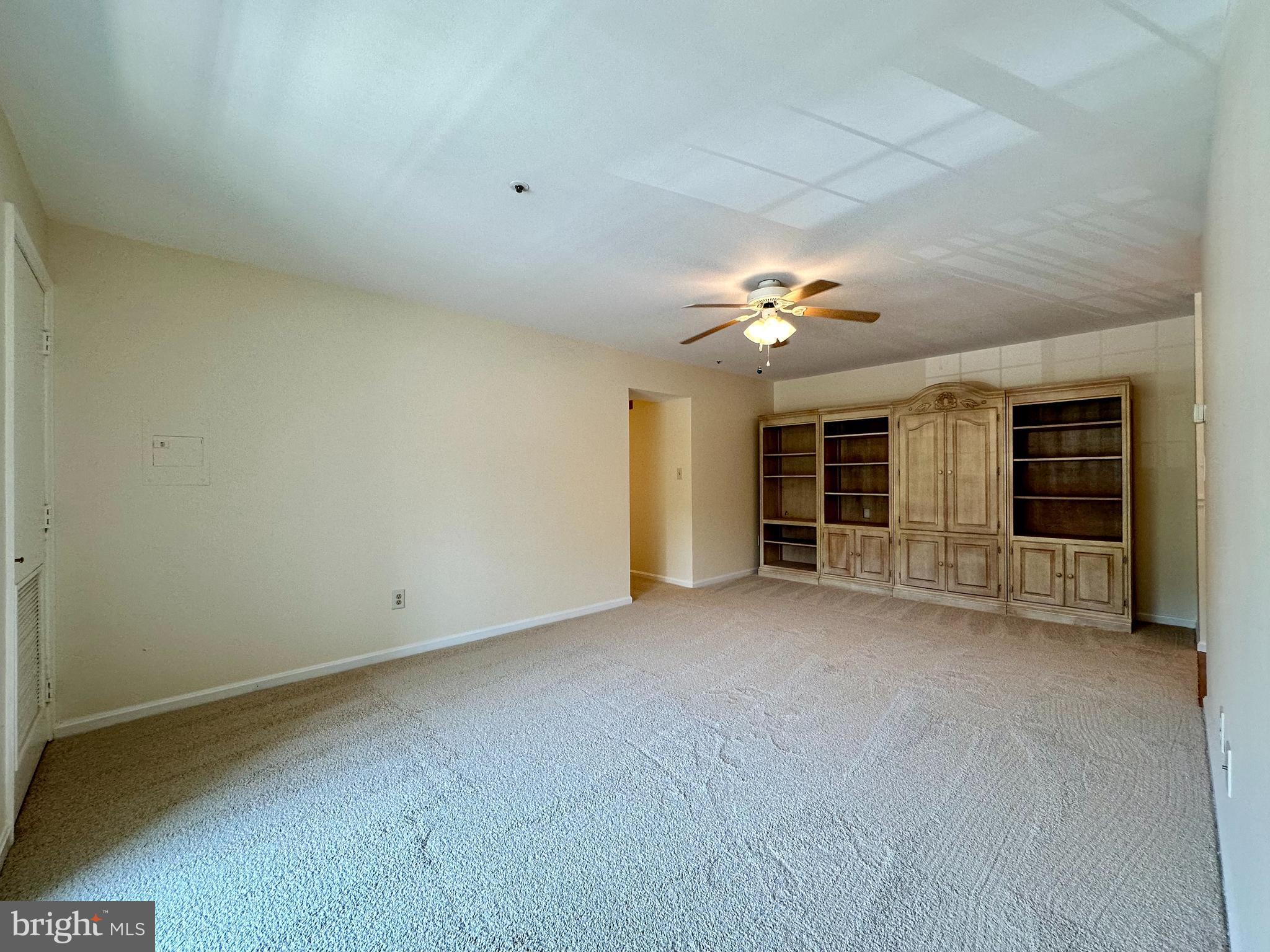 8493 Falls Run Road, Unit D Ellicott City, MD 21043 - Photo 15 of 44 Living room w/ brand new carpet/paint, ceiling fan