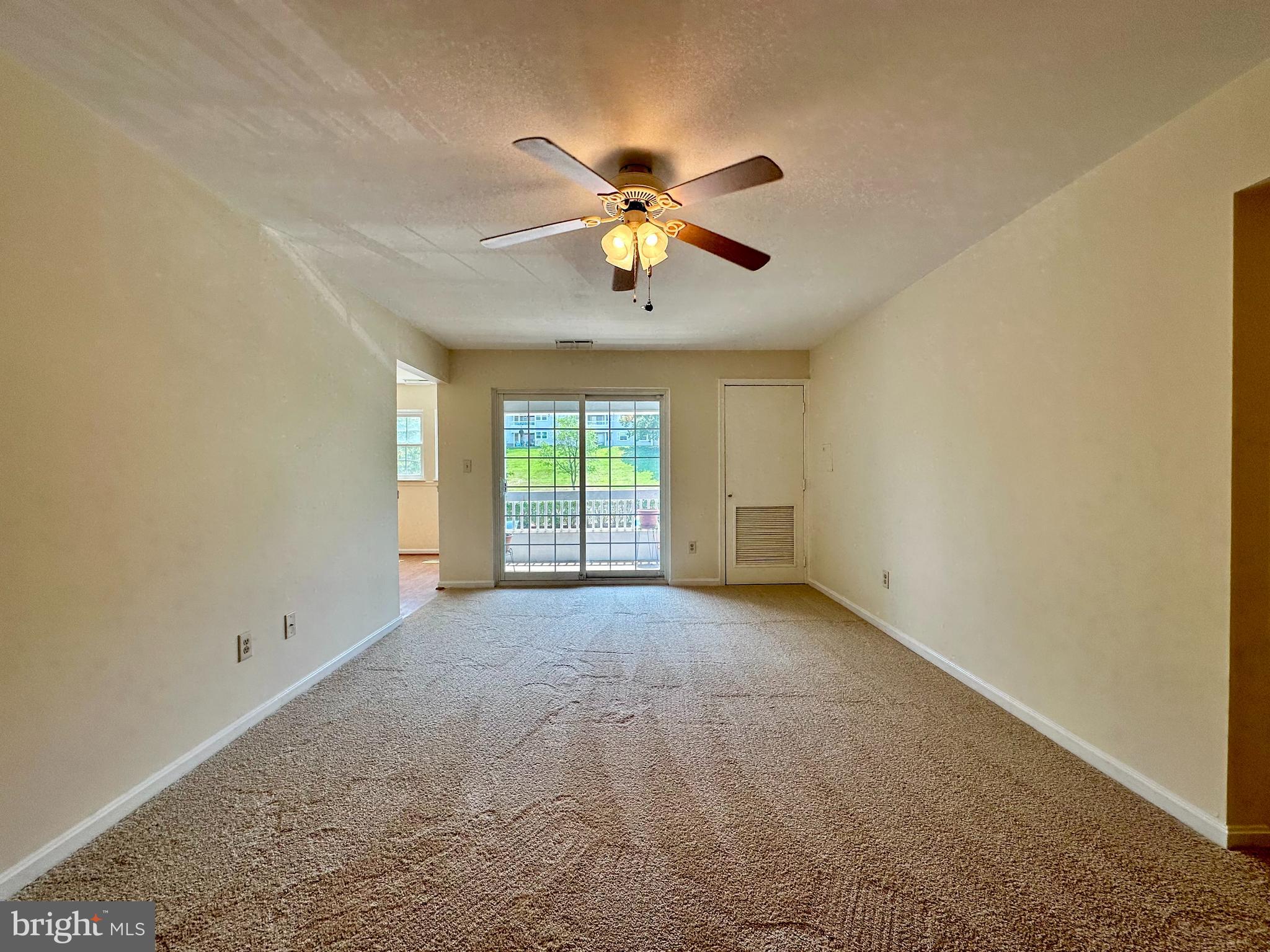 8493 Falls Run Road, Unit D Ellicott City, MD 21043 - Photo 17 of 44 Living room w/ brand new carpet/paint, ceiling fan