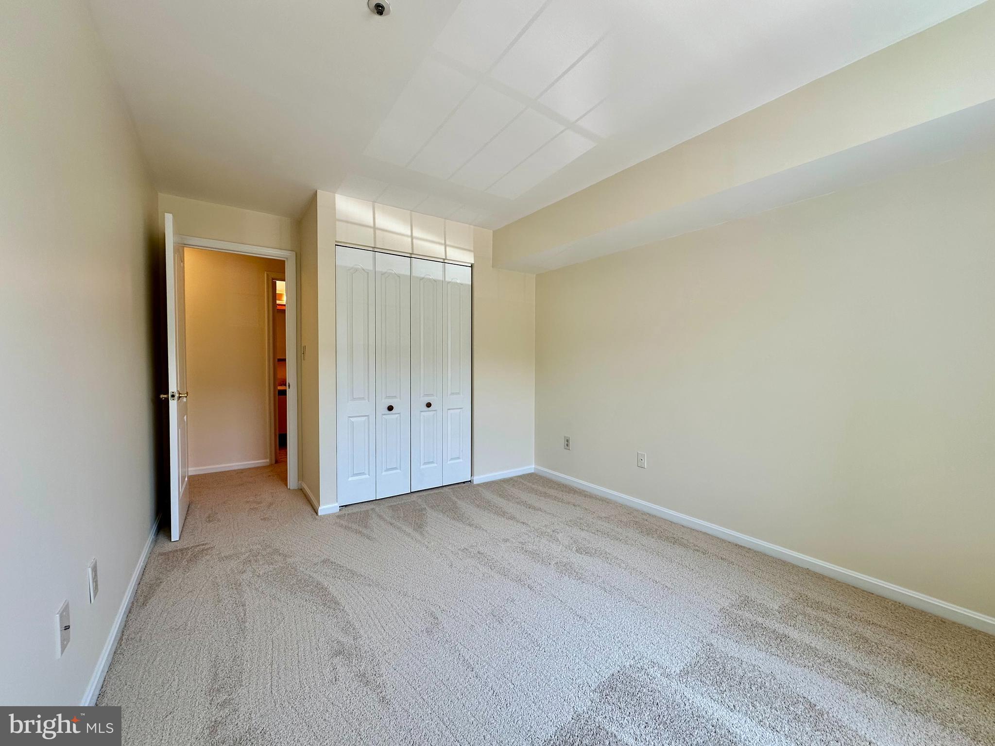 8493 Falls Run Road, Unit D Ellicott City, MD 21043 - Photo 23 of 44 Bedroom 2 with brand new carpet, paint