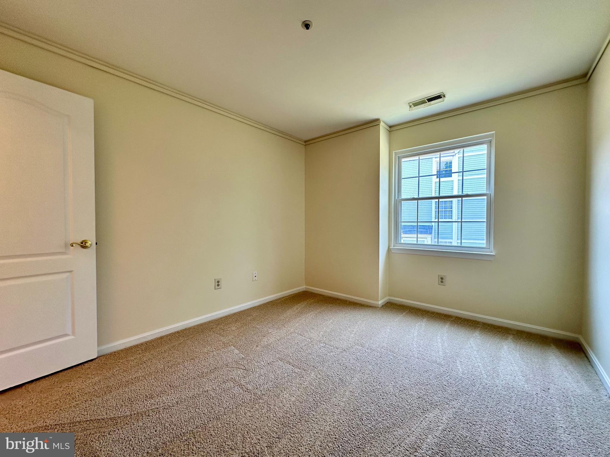 8493 Falls Run Road, Unit D Ellicott City, MD 21043 - Photo 27 of 44 Bedroom 3 w/ new carpet, paint, walk-in closet
