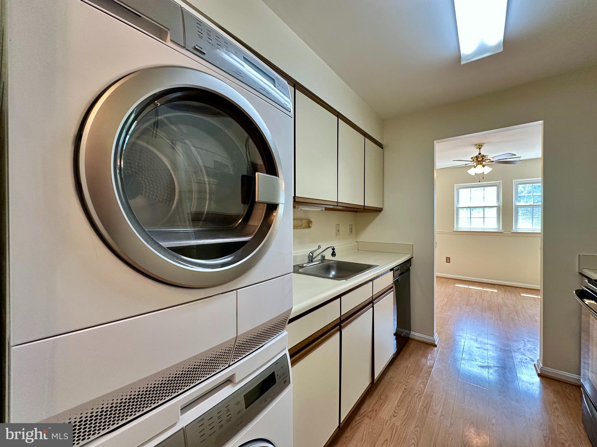 8493 Falls Run Road, Unit D Ellicott City, MD 21043 - Photo 5 of 44 Galley kitchen with convenient laundry