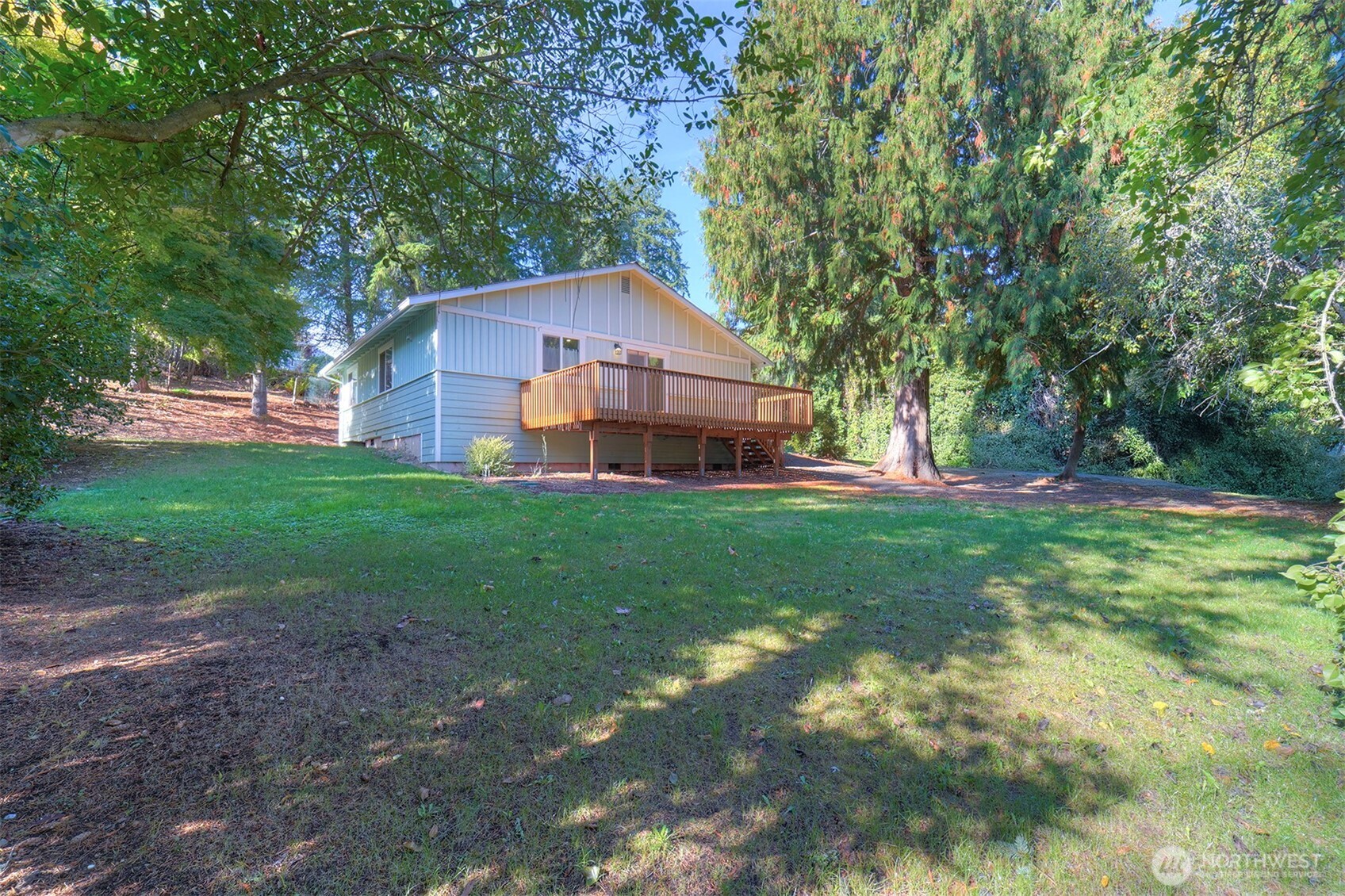 4931 Knute Anderson Road Northwest Silverdale, WA 98383 - Photo 33 of 37 a front view of house with yard and green space