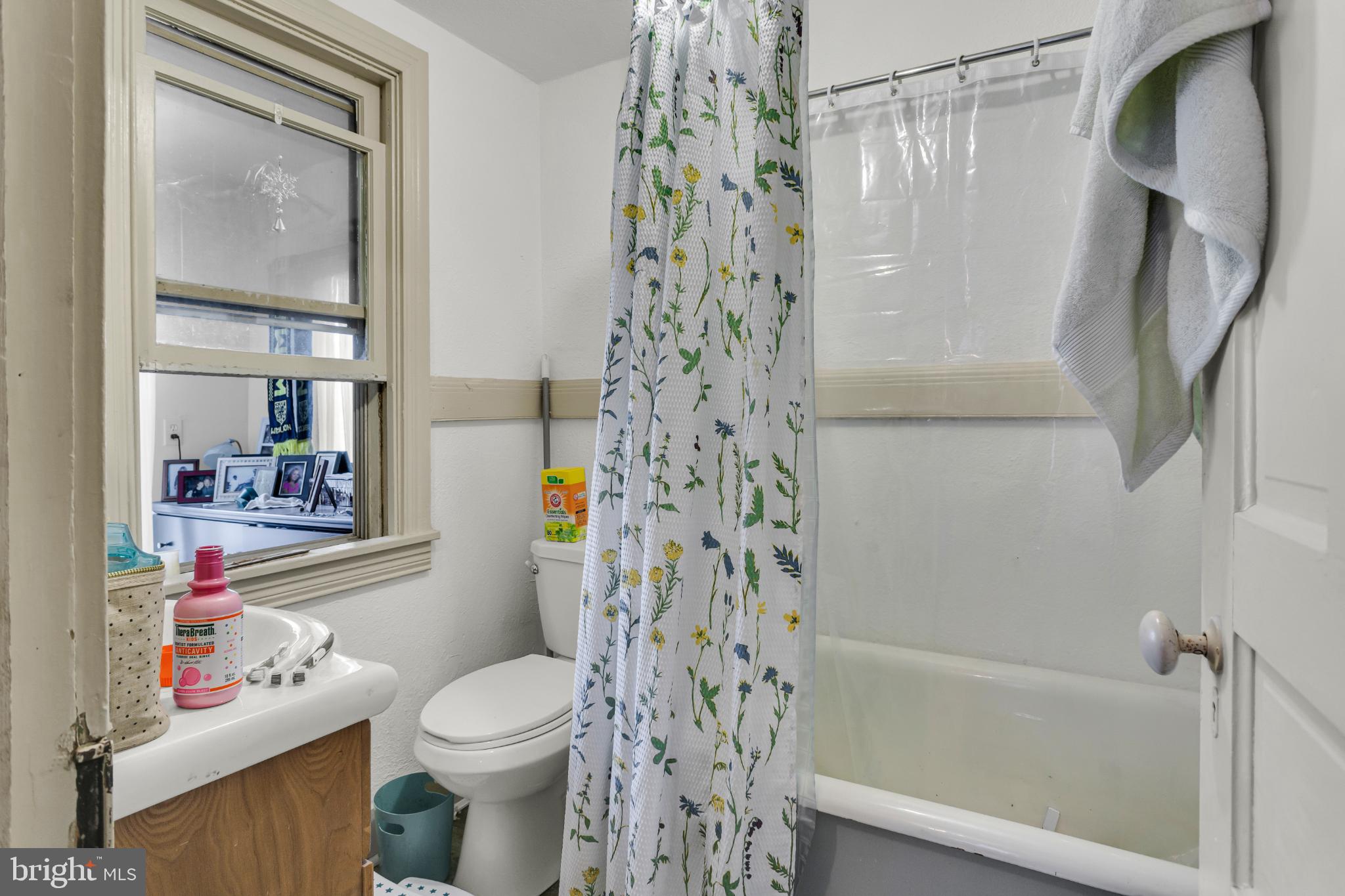 81 1st Avenue, Unit E Red Lion, PA 17356 - Photo 12 of 19 Charming bathroom with floral accents.